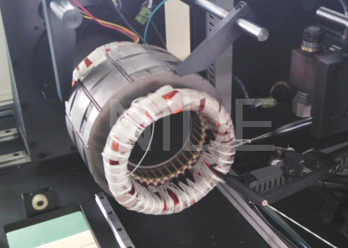 larger stator coil lacing machine.jpg